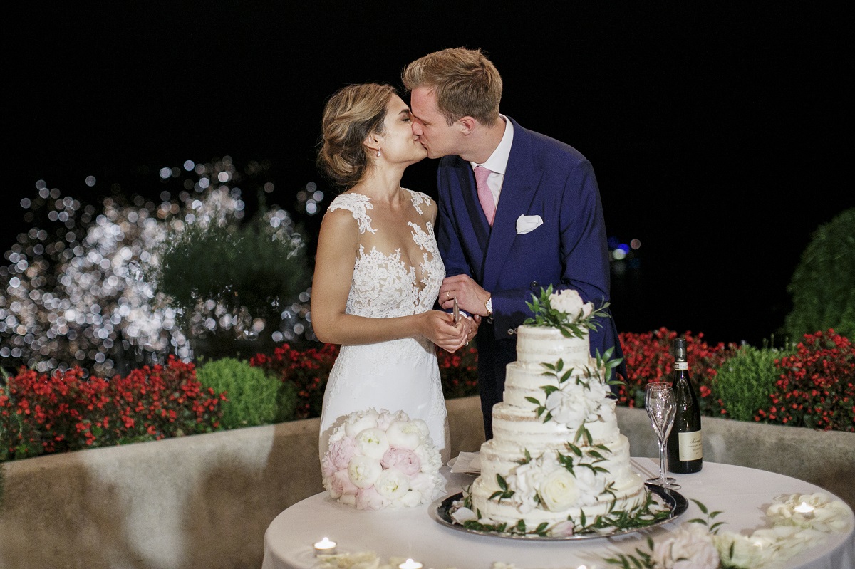 Isabella and Peter Wedding in Amalfi bride and groom kiss with fireworks