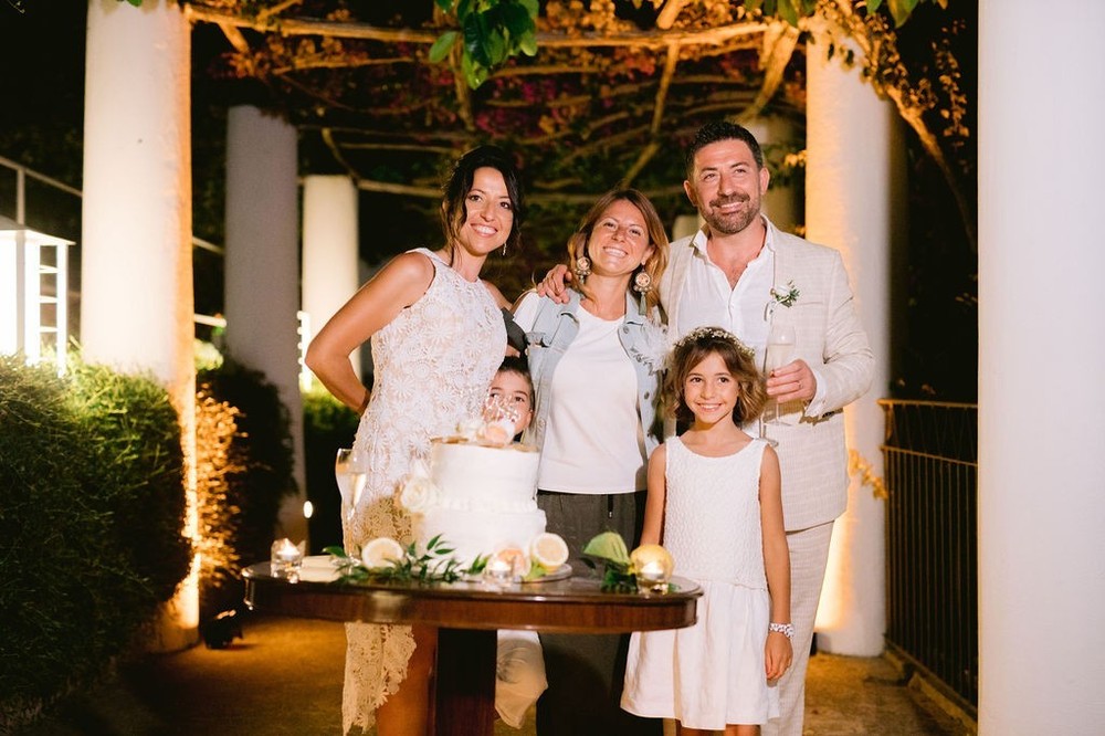Ines Napolitano Italian wedding planner with newlyweds and their kids
